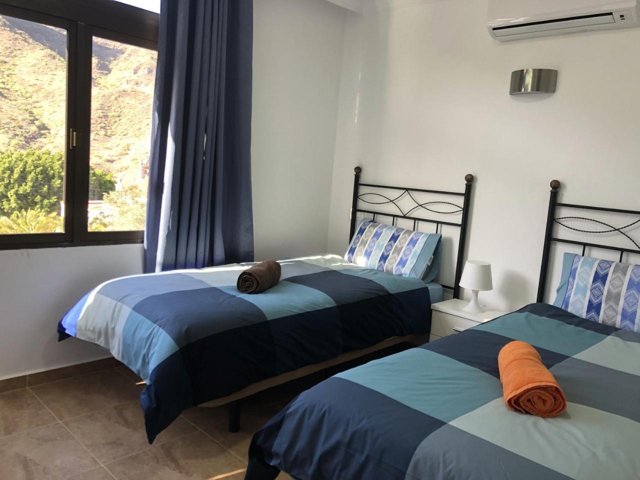 Apartamentos Acoran โมกัน ภายนอก รูปภาพ