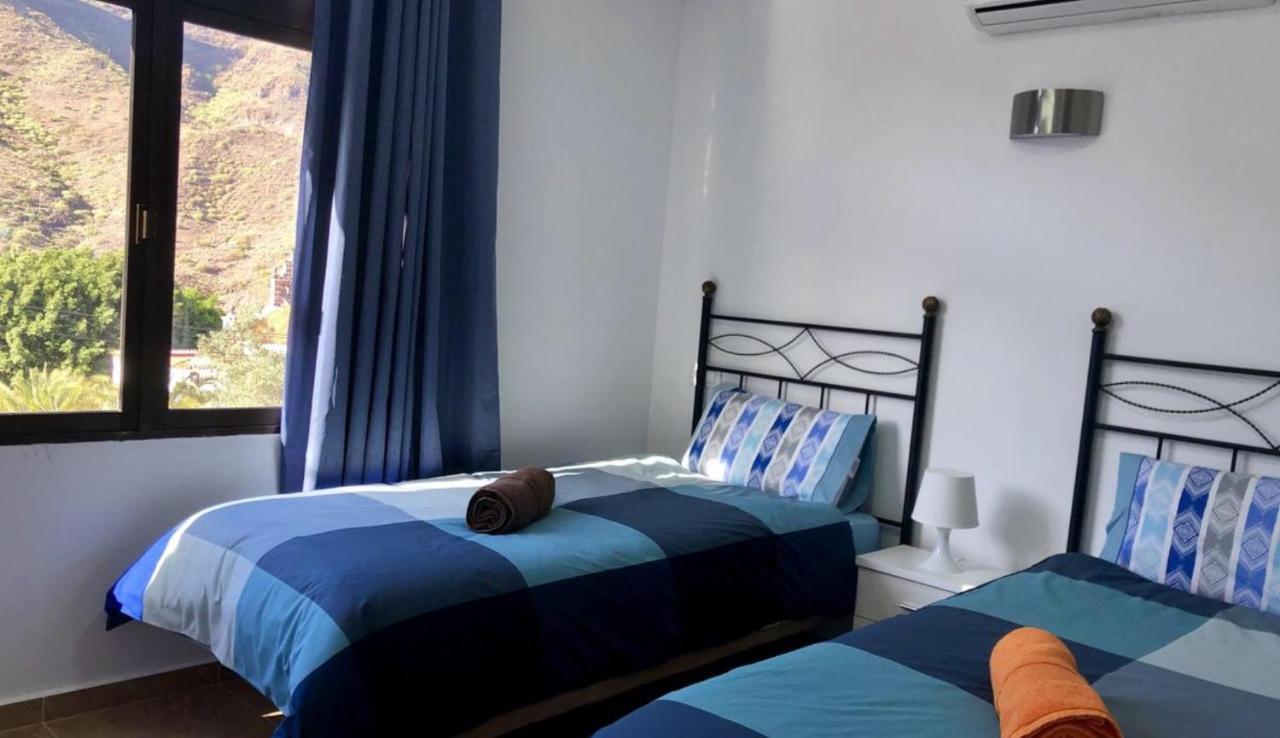 Apartamentos Acoran โมกัน ภายนอก รูปภาพ